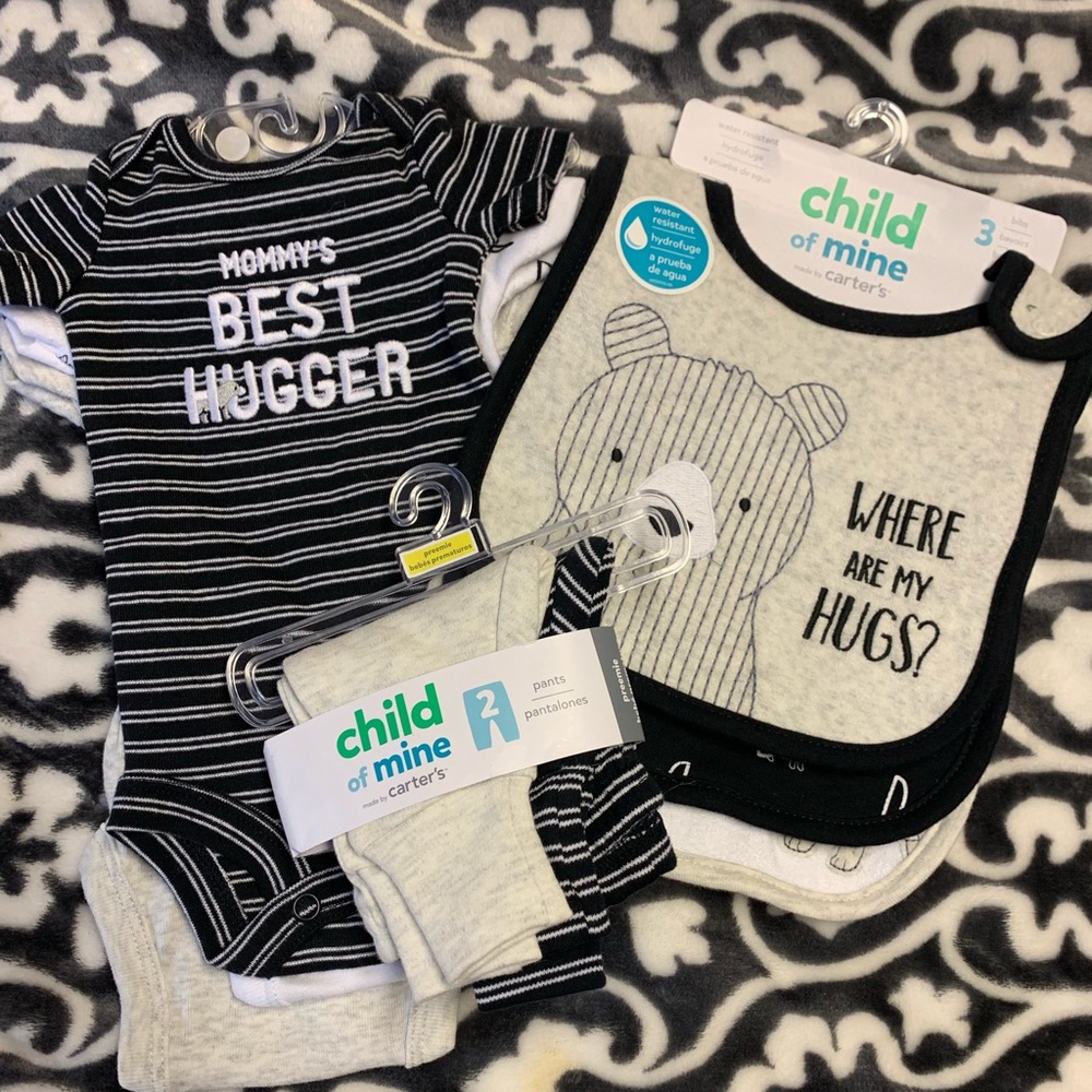Pants, onesies and bibs all brand new